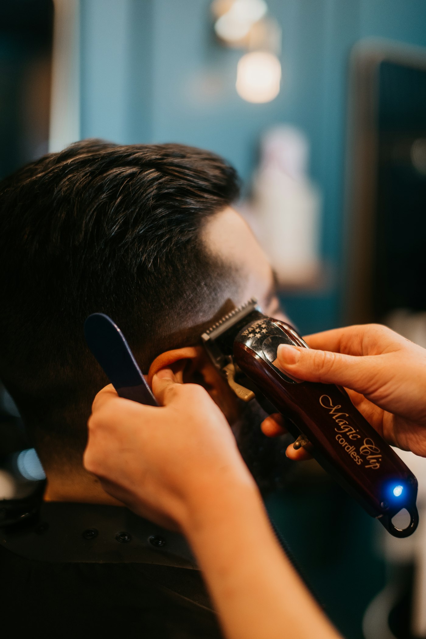 Close view of a classic tapered side part