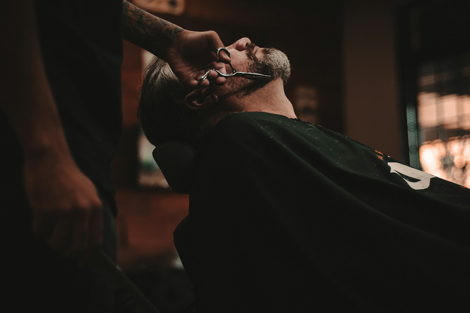 Client reclined for a traditional razor shave